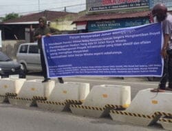 Median Jalan di Karya Wisata Membuat Rugi Para Pelaku Usaha