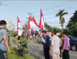 Pj Bupati Tebo H.Aspan, Pimpin Pemancangan Bendera di Jalur dua lintas Tebo