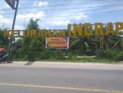 Polsek Indrapura Himbau Pengendara Lewat Pemasangan Spanduk Peringatan